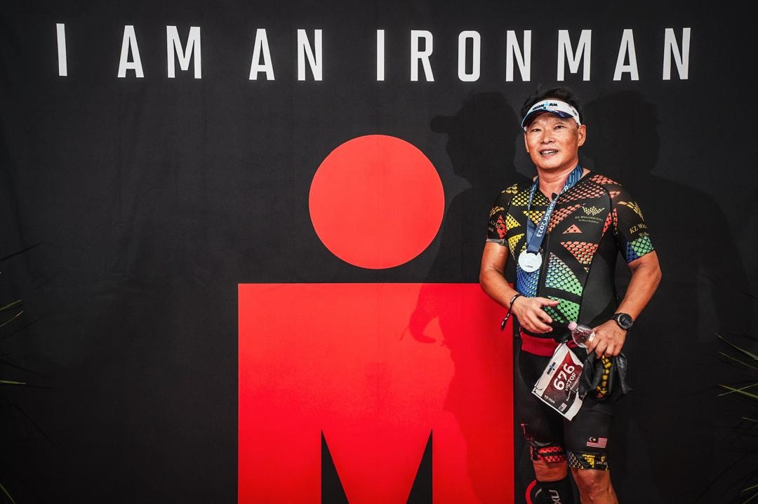Dr. Victor Chen with his Ironman finisher medal